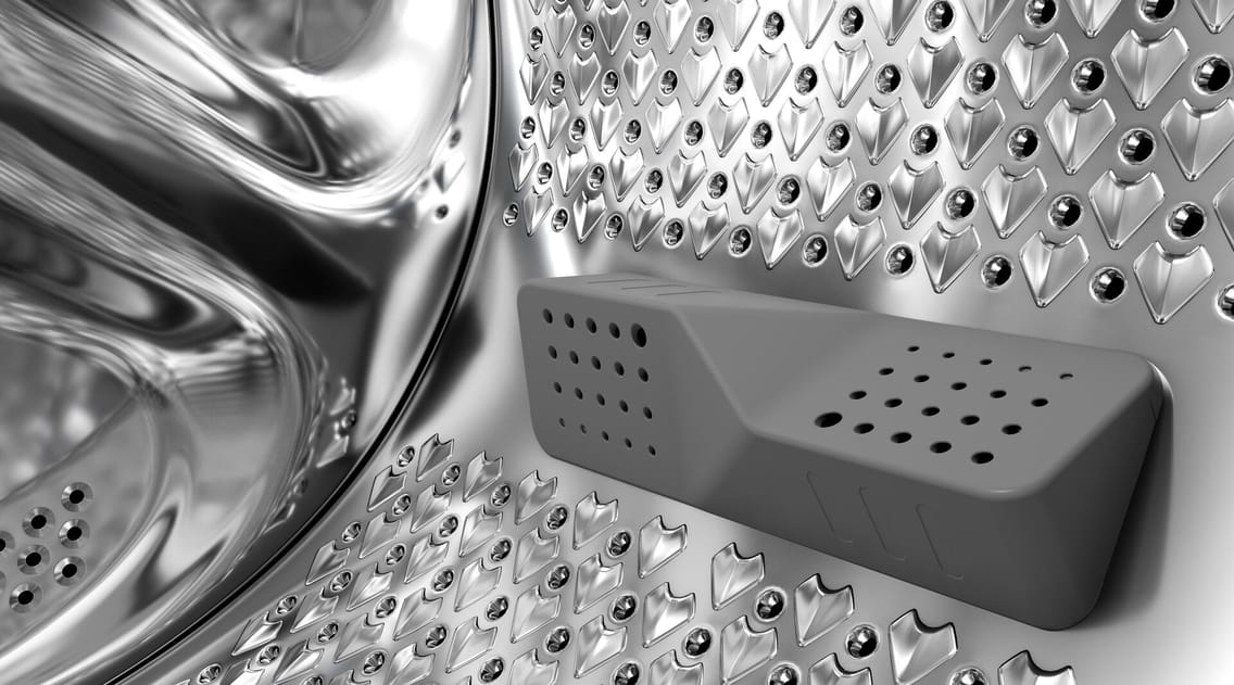 What is a steam feature in a washing machine