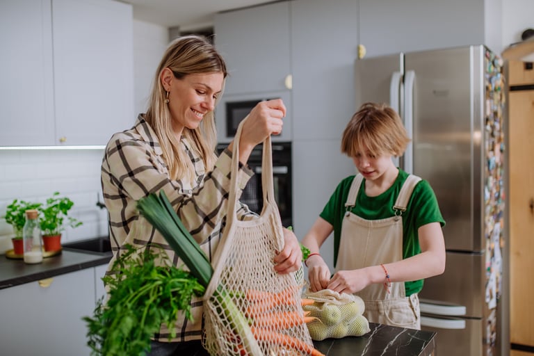 Mother and son choosing in kitchen